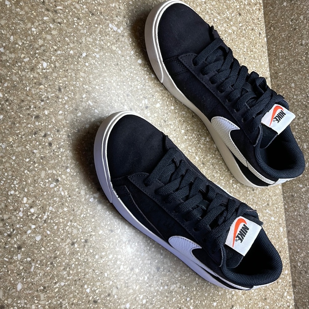 Ladies size 7 Nike black white white trim